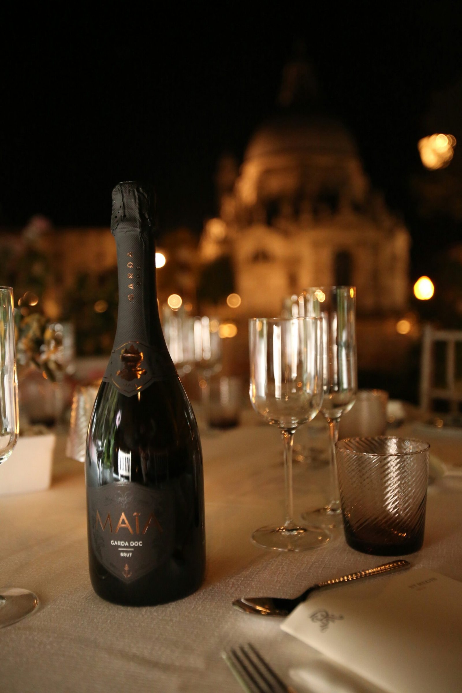 black glass bottle on table